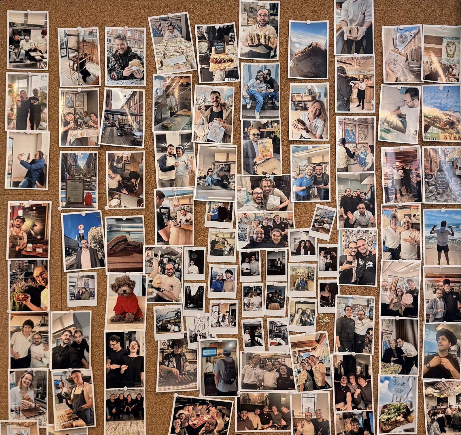 A wall of polaroid photos of the La Posata team over the years