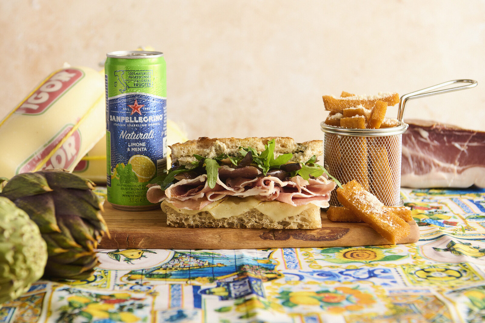 Prosciutto focaccia combo with San Pellegrino and polenta fries