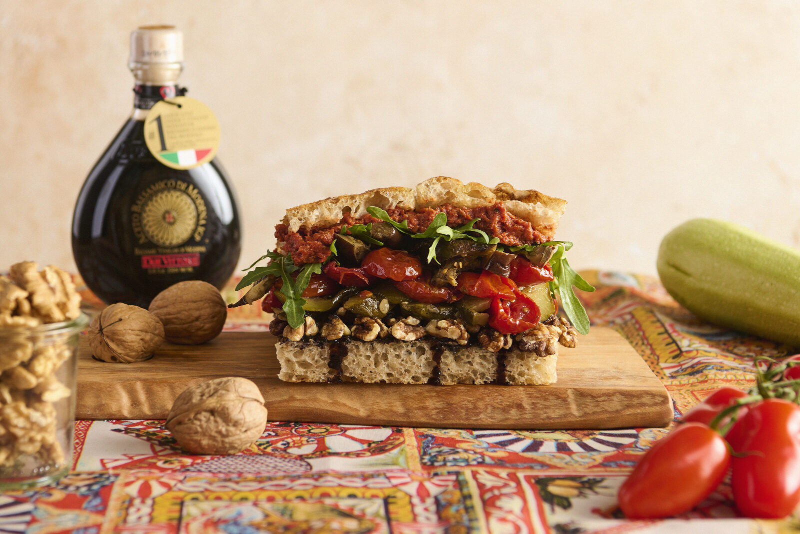 Veggie focaccia with balsamic glaze and walnuts