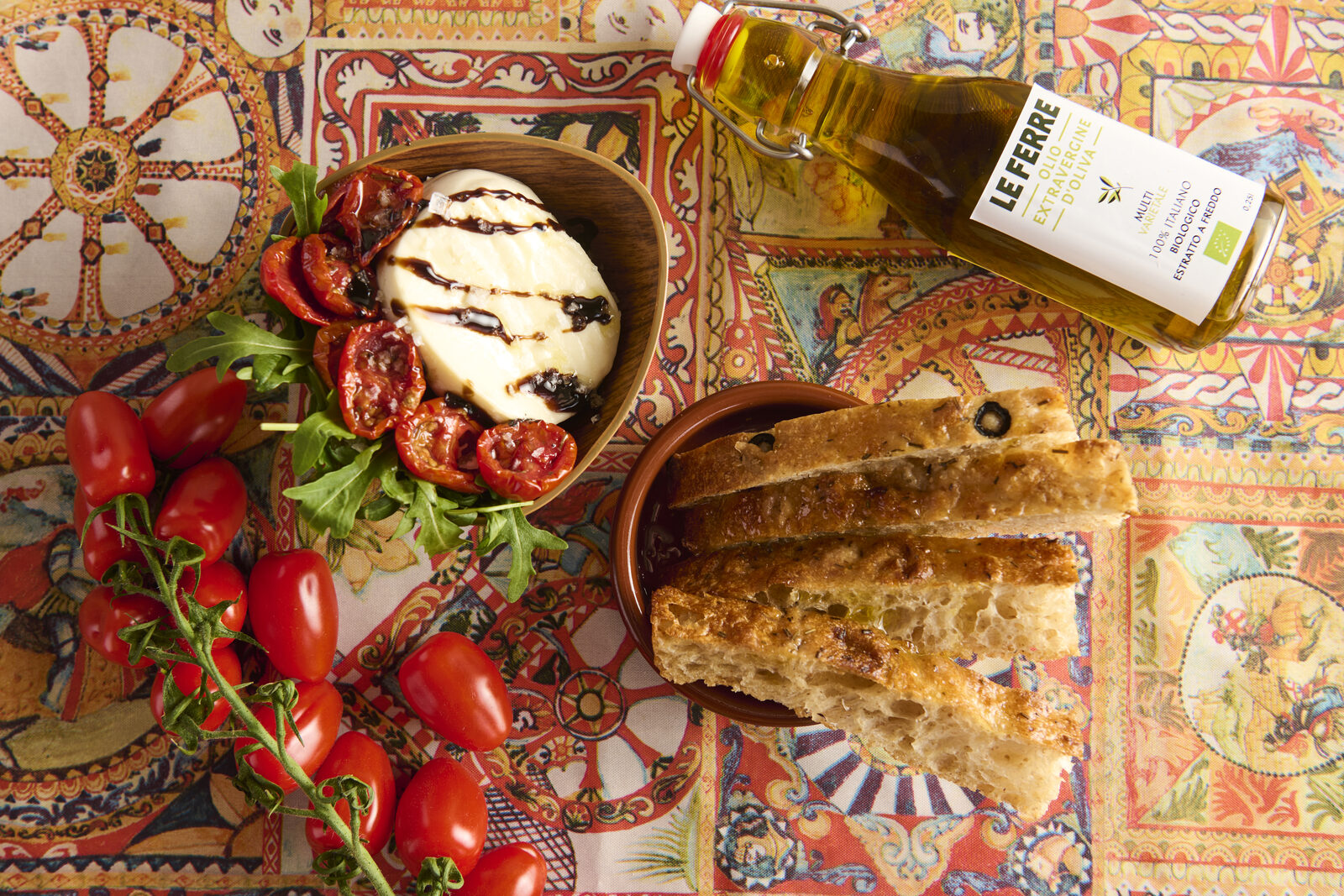 Burrata with sun-dried tomatoes and olive oil